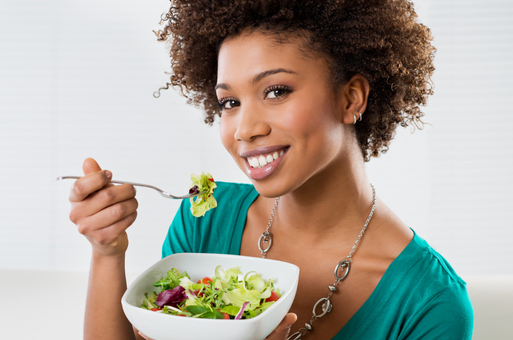 a person eating healthy food